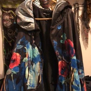 A floral eclectic fashion jacket by Samuel Dong.